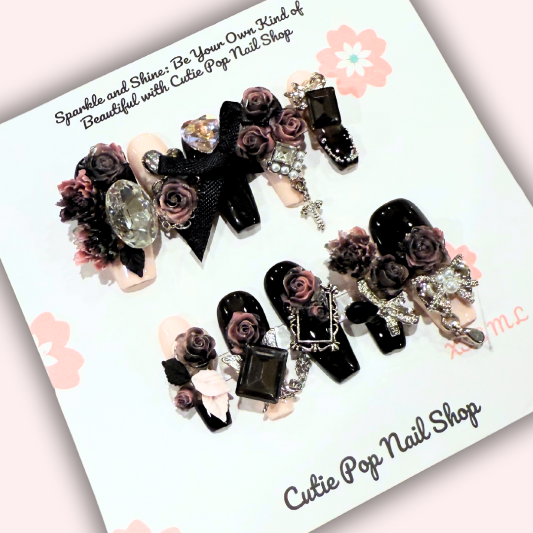 Blackpink-inspired Gothic Rose Concert press-on nails by CutiePop Nail Shop, featuring black and pink gothic nail art with rose designs, metallic accents, and bold concert-ready details