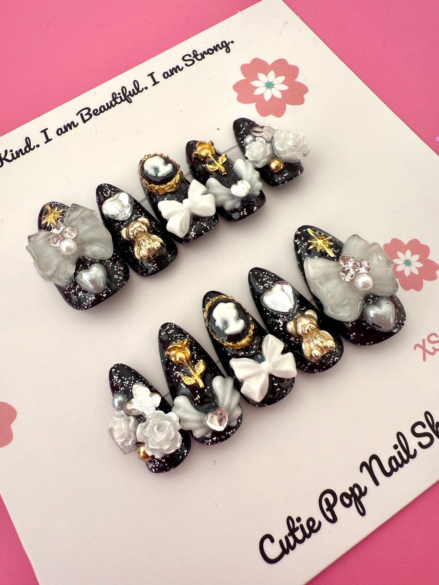 Victorian Shadows press-on nails by CutiePop Nail Shop featuring medium-length coffin-shaped nails with a gothic-inspired design. Showcasing intricate dark tones, lace-like patterns, and elegant vintage accents for a moody, romantic aesthetic.