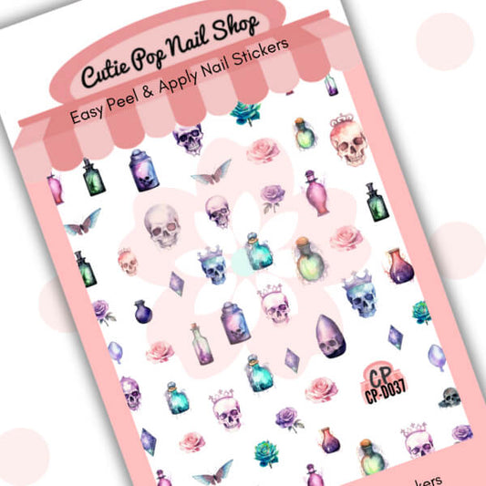 Skulls and Potions nail stickers by Cutie Pop Nail Shop featuring a spooky cute mix of skulls, potion bottles, roses, crystals, and bats in pastel and jewel tones arranged on a pink edged display card labeled "Easy Peel & Apply Nail Stickers.