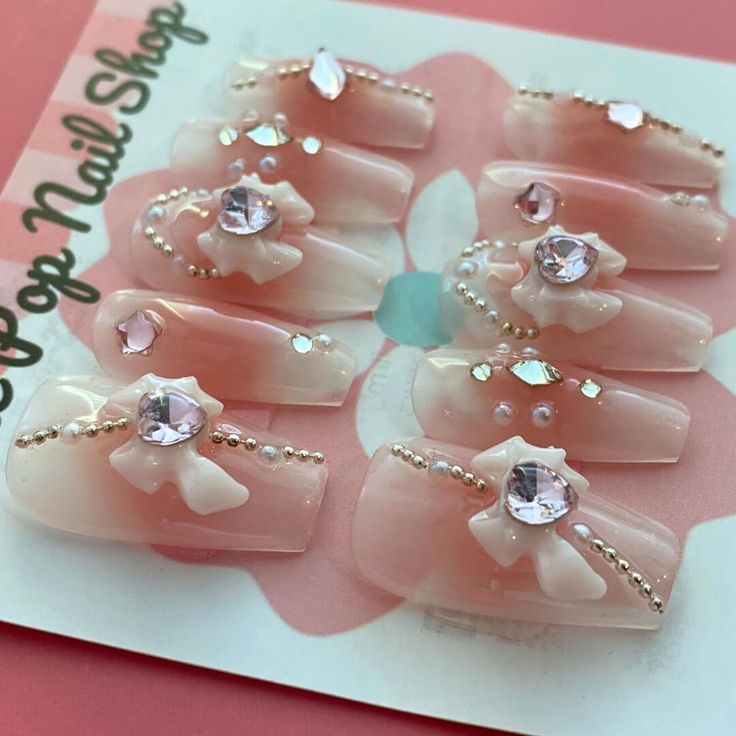 Sweet Moon Guardian press-on nails by CutiePop Nail Shop featuring medium-length coffin-shaped nails in soft pastel tones with dreamy moon and star motifs. Accented with glitter, tiny heart decals, and Sailor Moon-inspired elements, this magical set evokes a sweet celestial vibe. Includes 10 reusable handmade nails, jelly adhesive tabs, mini nail file, and cuticle stick—perfect for moonlit transformations and kawaii fans alike.