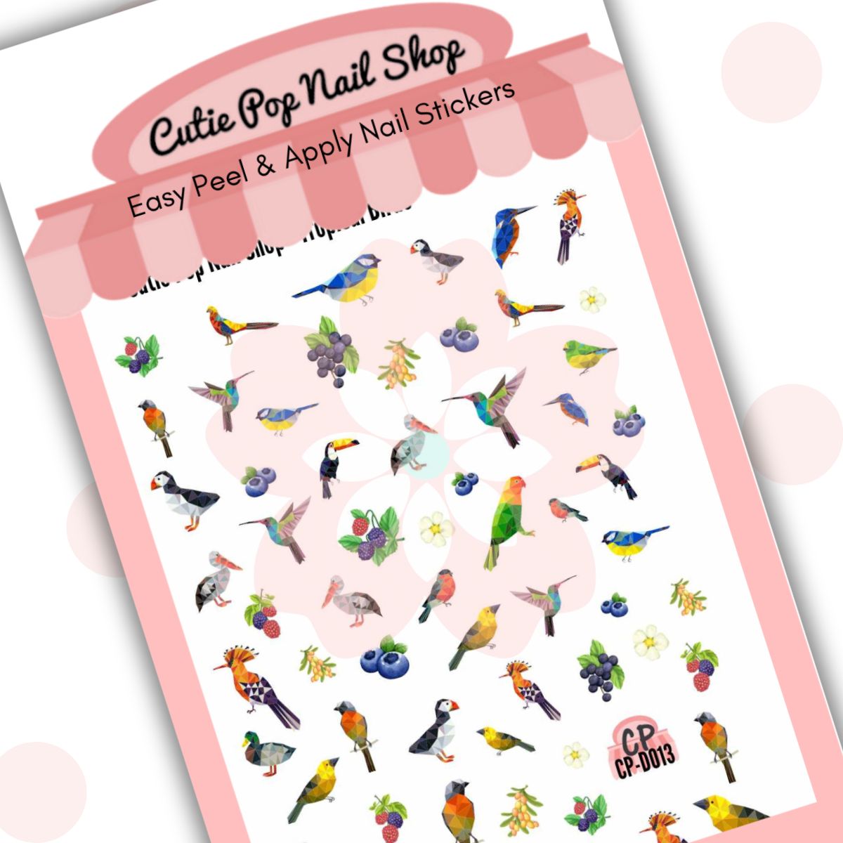 This image showcases Cutie Pop Nail Shop’s Tropical Birds nail decals against a white background with a Cutie Pop Nail Shop logo and watermark. The nail decal designs include a range of multi-colored, polygonal birds including cockatoos, parakeets, pelicans, toucans, blue tits, kingfishers, puffins, robins, and painted buntings, as well as white flowers, blueberries, grapes, white berries, and blackberries.