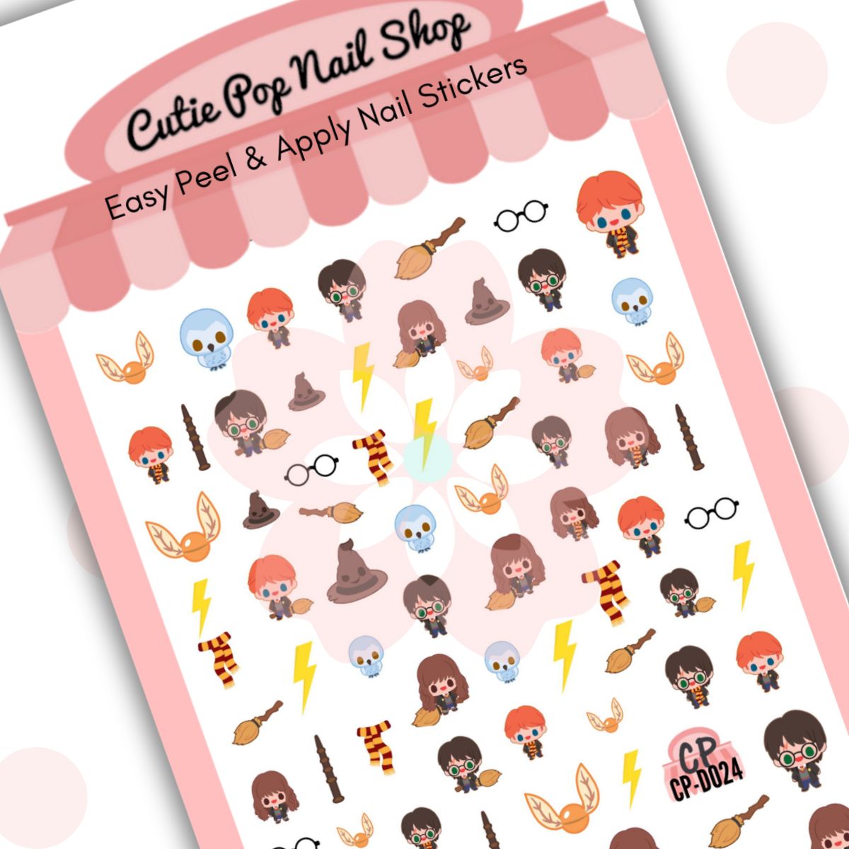 Wizards (A) nail stickers by Cutie Pop Nail Shop featuring chibi style designs of a famous wizard and his friends, along with magical creatures, enchanted hats, scarves, broomsticks, wands, glasses, lightning scars, and golden trinkets arranged on a pink edged display card labeled "Easy Peel & Apply Nail Stickers."