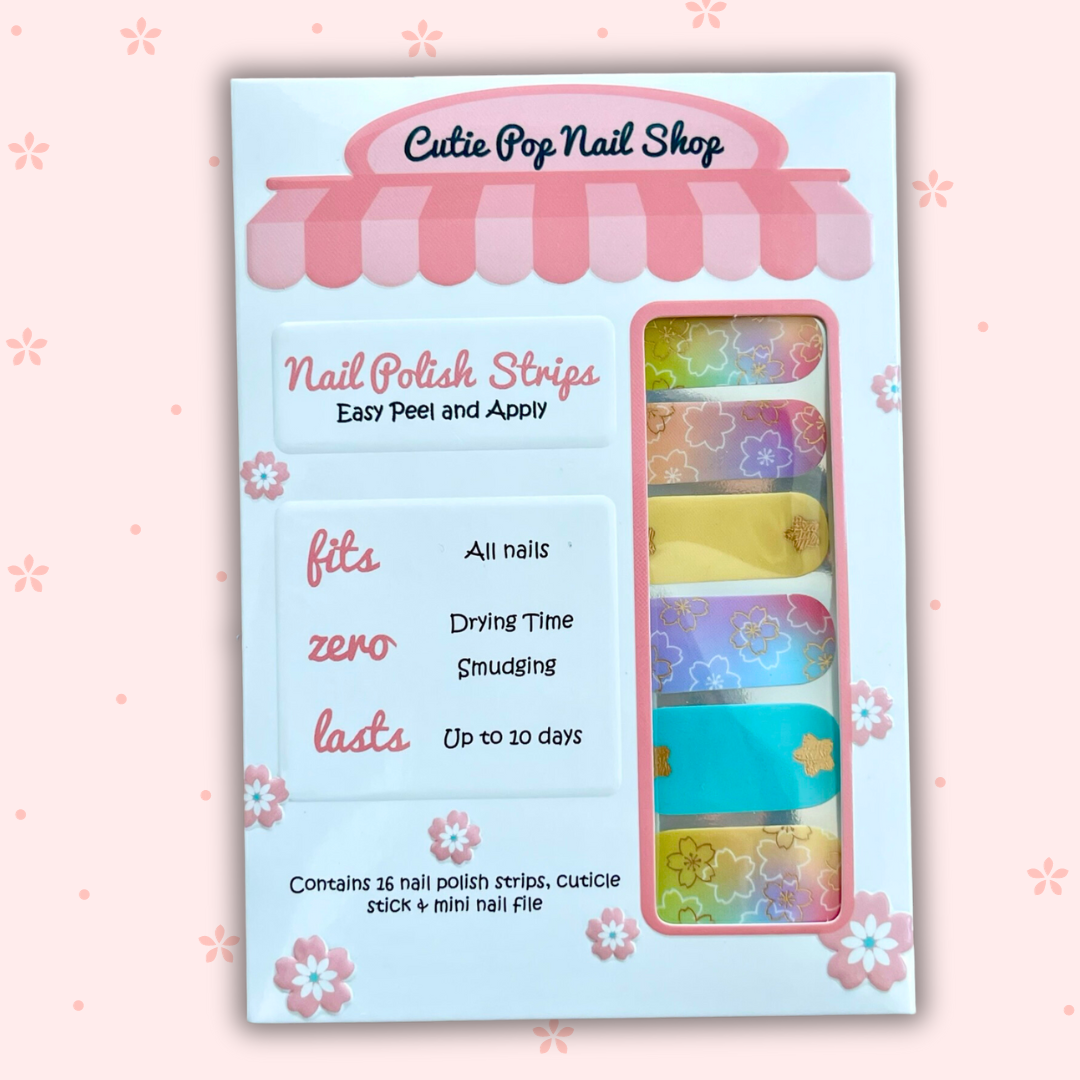 HIME pastel ombre nail strips featuring a soft gradient of delicate colors adorned with sakura blossom flowers and shimmering metallic gold accents. Inspired by Japanese motifs, this anime-inspired nail art perfectly complements kimono attire or cosplay ensembles, blending kawaii charm with elegant craftsmanship for a unique and stylish manicure.