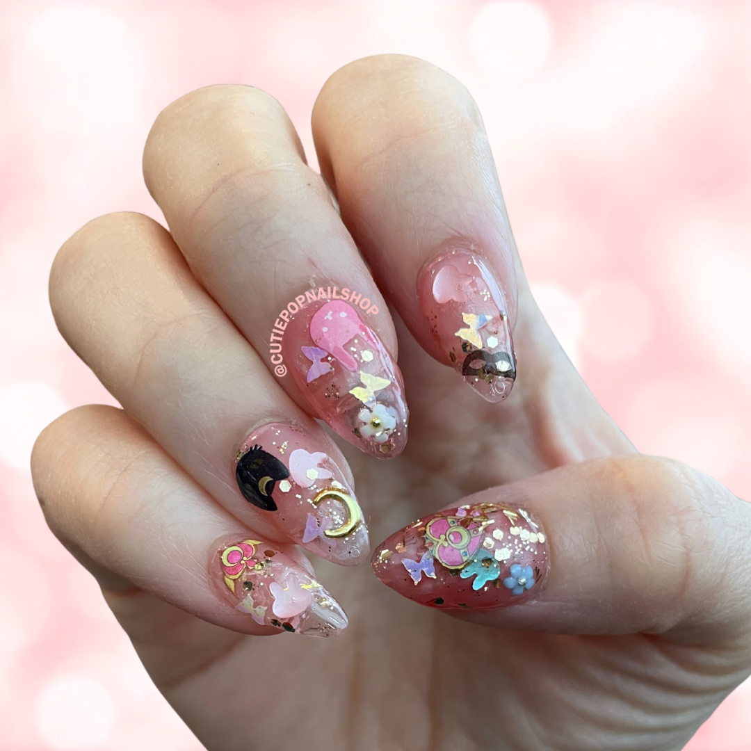 Luna nail decals with moon cats, bows, moons, roses, masks, and magical celestial details
