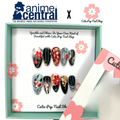 Anime Central – Kitsune press on nails by CutiePop Nail Shop featuring medium round shaped nails with anime-inspired fox art and red floral accents. This design blends traditional Japanese kitsune motifs with modern nail aesthetics for a bold and mystical look.

