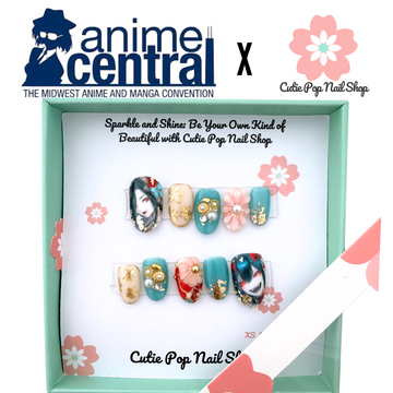 Anime Central – Yokai Girl press on nails by CutiePop Nail Shop featuring short round shaped nails with anime-inspired art of a yokai girl, incorporating mystical and moody design elements. Styled in deep colors with elegant details for a bold, artistic statement.

