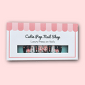 Anya press‑on nails by CutiePop Nail Shop featuring medium-length almond-shaped nails in a mix of pastel pink, lavender, and black tones. Each nail showcases playful chibi-style decals of Anya from Spy × Family, accented with tiny hearts, stars, and glossy gel shine. The set includes 10 handmade reusable nails, jelly adhesive tabs, a mini nail file, and a cuticle stick—crafted for fans of kawaii anime style and covert charm.