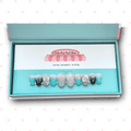 Fairytale press‑on nails by CutiePop Nail Shop featuring medium-length almond and round-shaped nails in a dreamy turquoise-to-navy gradient. These whimsical nails are accented with iridescent resin butterfly charms, holographic sequin glitter, and shimmering tones that evoke a magical wonderland vibe. Each set includes 10 reusable handmade nails, jelly adhesive tabs, a mini nail file, and a cuticle stick—perfect for an elegant yet playful fairy-tale inspired manicure.