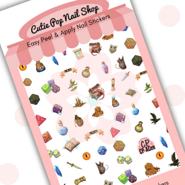 CPNS x ACen Roll for Initiative nail stickers by Cutie Pop Nail Shop featuring a fantasy RPG theme with colorful dice, potions, swords, spellbooks, and magical elements arranged on a pink edged display card labeled "Easy Peel & Apply Nail Stickers.
