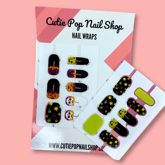 Spooky Apple Halloween nail wraps with candy apples, pumpkins, and star designs