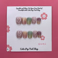 Pastel Holo press-on nails by CutiePop Nail Shop feature extra-short square-shaped nails in soft pastel hues with a mesmerizing holographic finish. This dreamy, iridescent design adds a subtle yet magical glow to your everyday look. Each kit includes 10 reusable handmade nails, jelly adhesive tabs, a mini nail file, and a cuticle stick.

