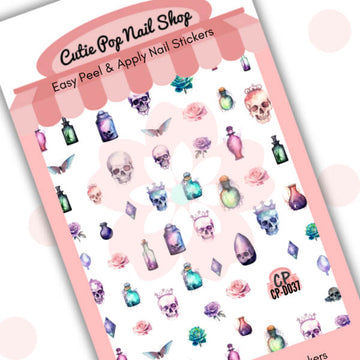 Skulls and Potions nail stickers by Cutie Pop Nail Shop featuring a spooky cute mix of skulls, potion bottles, roses, crystals, and bats in pastel and jewel tones arranged on a pink edged display card labeled "Easy Peel & Apply Nail Stickers.