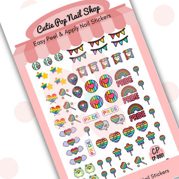 Rainbow Pride nail stickers by Cutie Pop Nail Shop featuring ultra thin 2D designs celebrating the LGBTQ+ community, including rainbows, stars, planets, flags, bunting, and a cute froggy holding a rainbow heart arranged on a pink edged display card labeled "Easy Peel & Apply Nail Stickers."