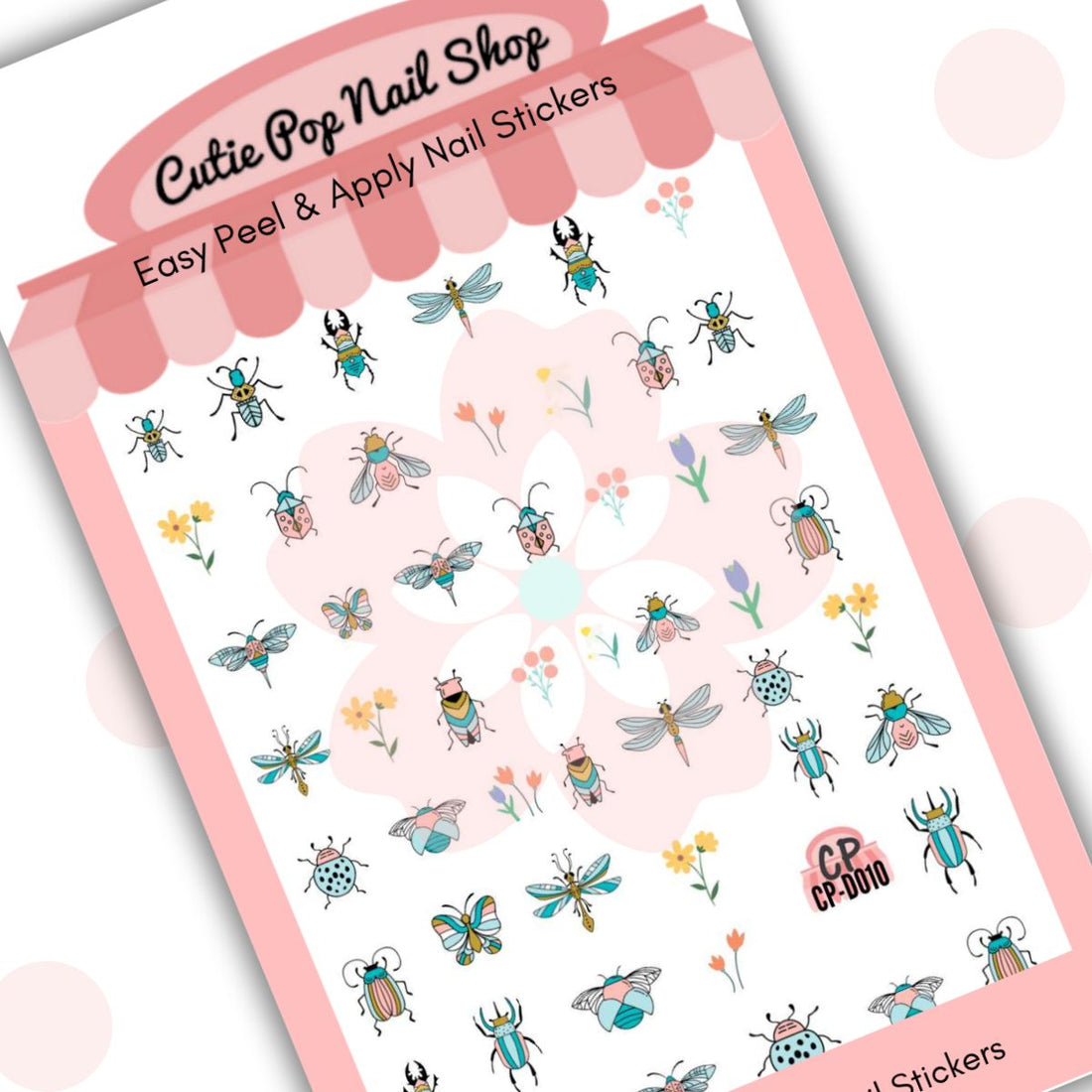 Bugs & Beetles nail stickers by Cutie Pop Nail Shop featuring ultra thin 2D designs of realistic bugs and beetles along with pastel colored spring flowers in light blue and pink tones arranged on a pink edged display card labeled "Easy Peel & Apply Nail Stickers."
