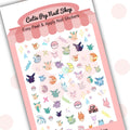 Pastel Eevolution nail stickers by Cutie Pop Nail Shop featuring hand-drawn chibi-style Pokémon designs of Eevee and its evolutions in soft pastel tones, including fire, water, and electric types arranged on a pink edged display card labeled 